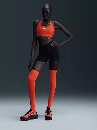 NIKE | Reggiseno sportivo da donna Swoosh a supporto medio | rot